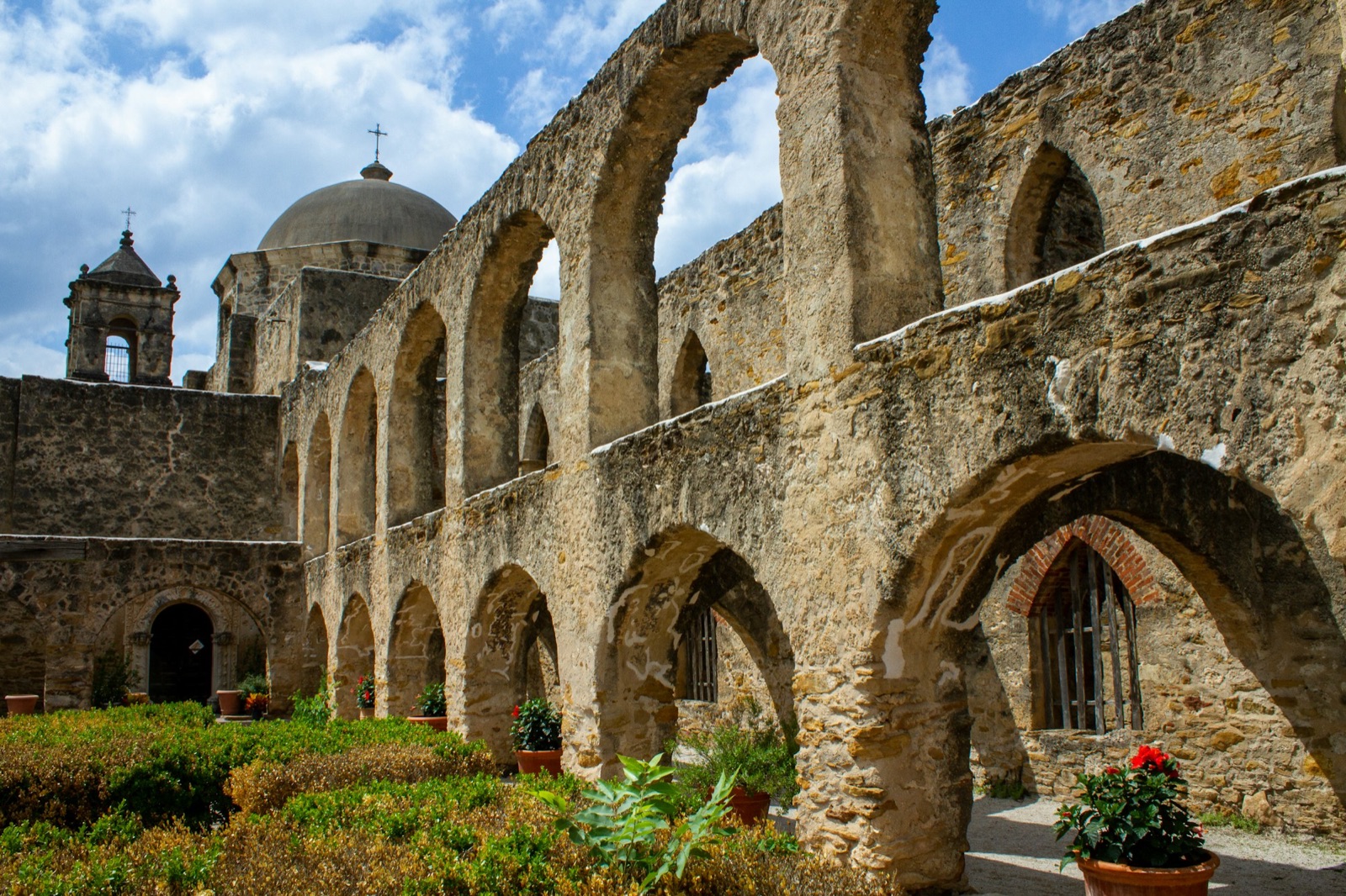 Dome and stone arches at Mission San Jose in San Antonio