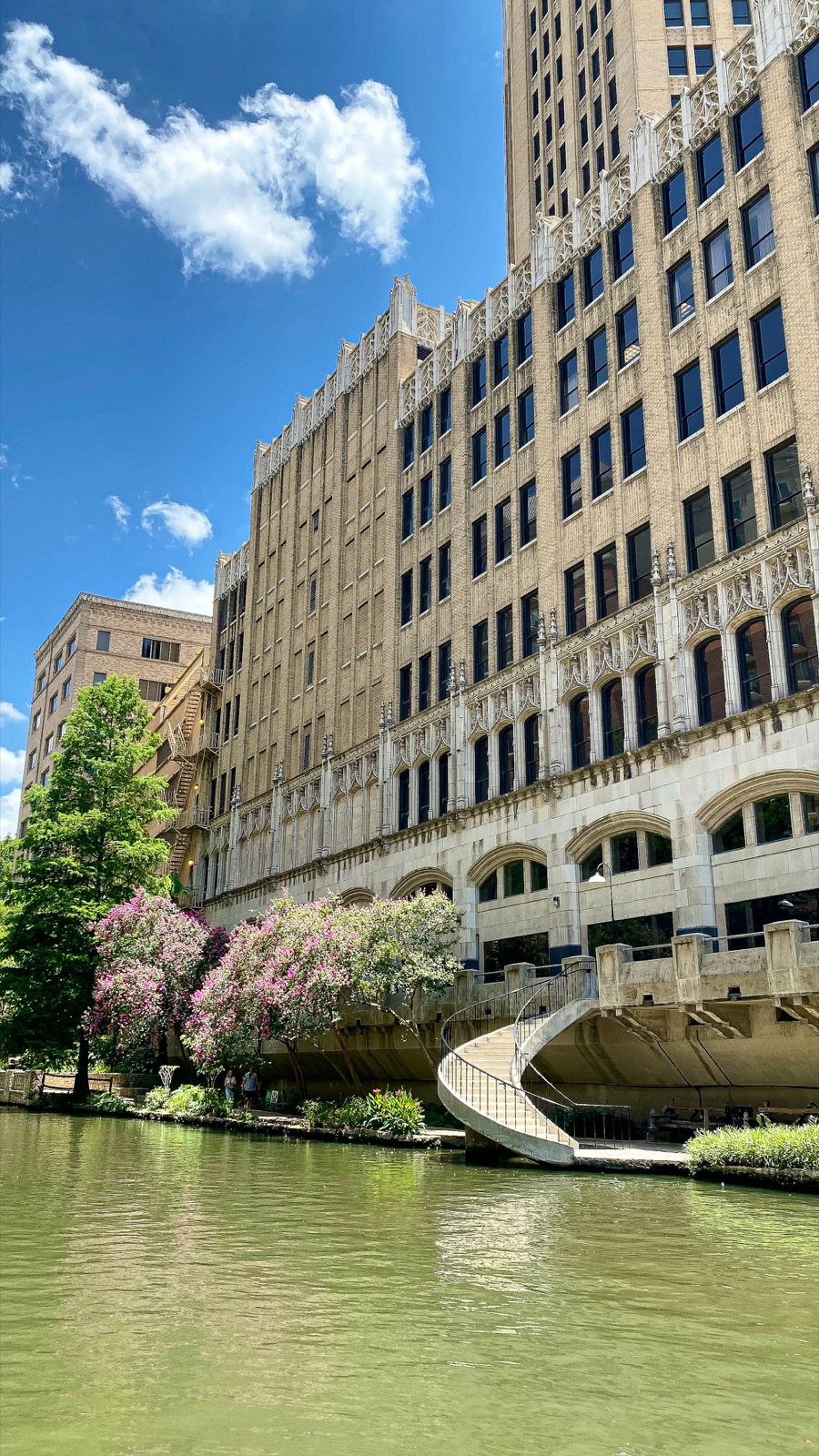Stone staircase and spring blooms along the San Antonio River Walk